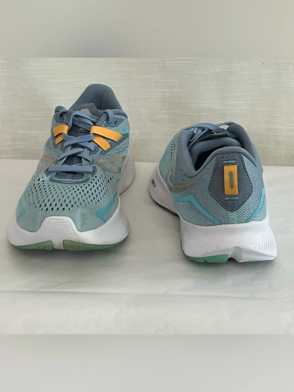 Saucony Ride 15 Women's Light Blue Athletic Sneakers with Yellow Accents